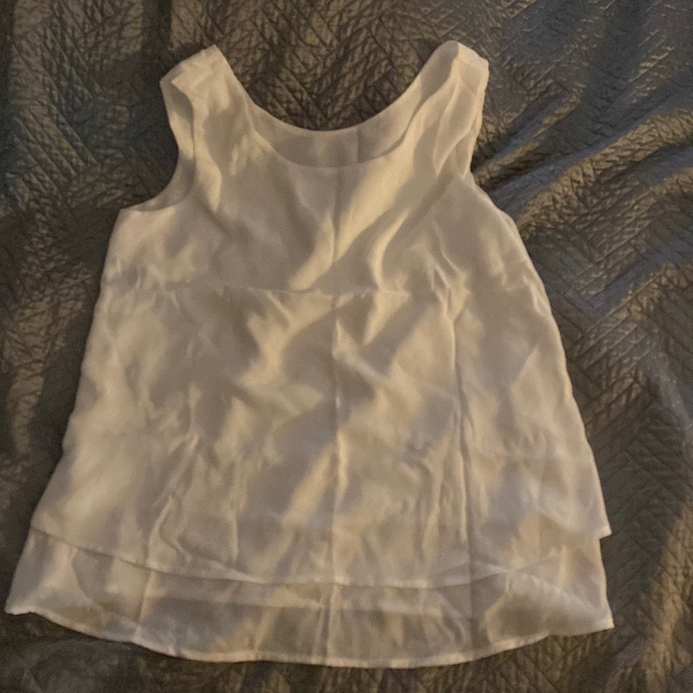 White/cream colored sleeveless top